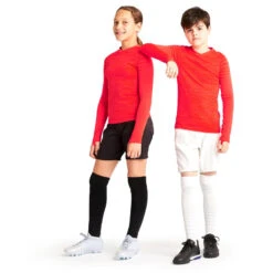 Kipsta SOUS-VETEMENT THERMIQUE HAUT MANCHES LONGUES ENFANT ORANGE KEEPDRY 500 11 Kipsta SOUS-VETEMENT THERMIQUE HAUT MANCHES LONGUES ENFANT ORANGE KEEPDRY 500 -Sports De Balle sous vetement thermique haut manches longues enfant orange keepdry 500 2